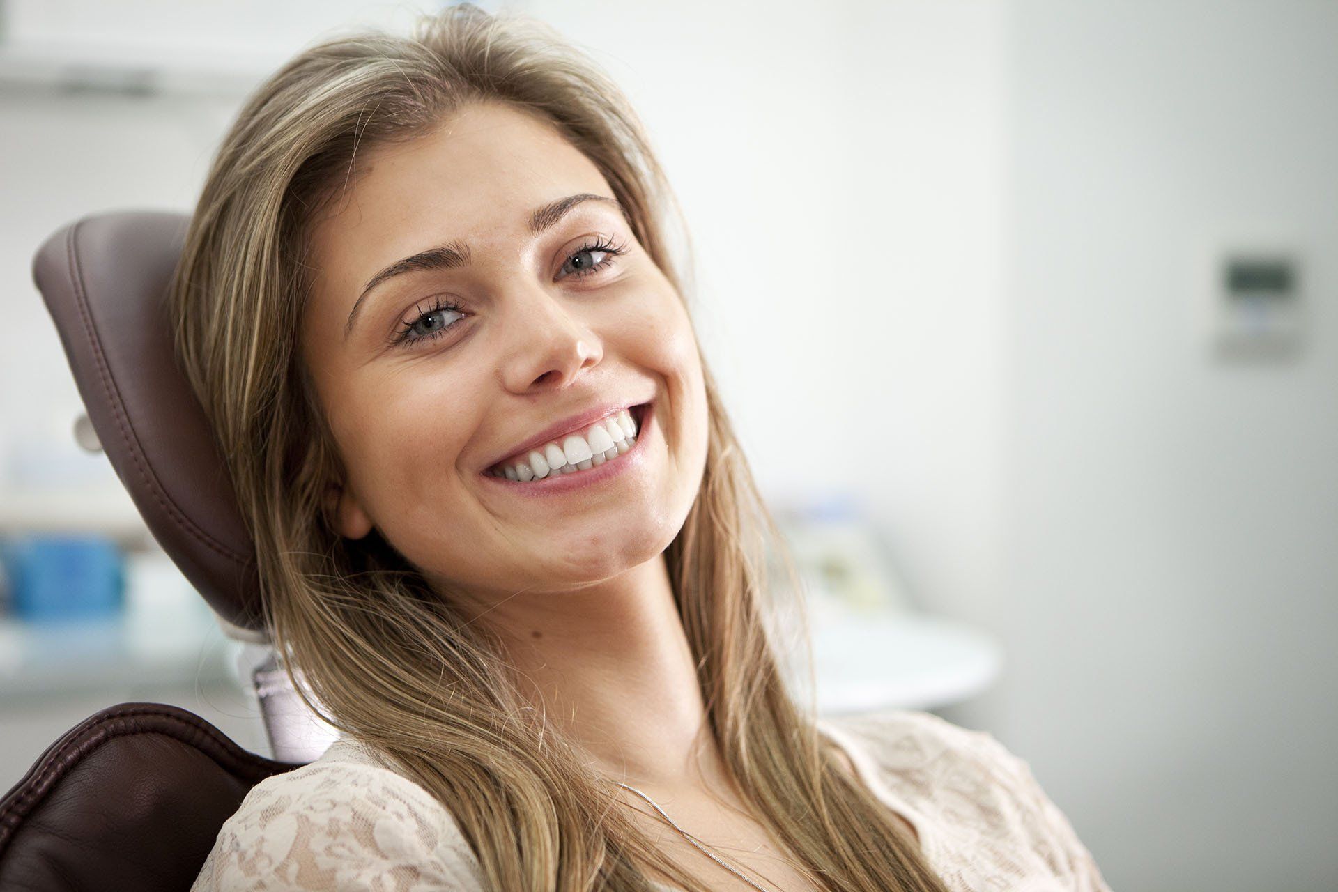 Woman Smiling While Sitting in a Dental Chair — Seminole, OK — David Keck, DDS
